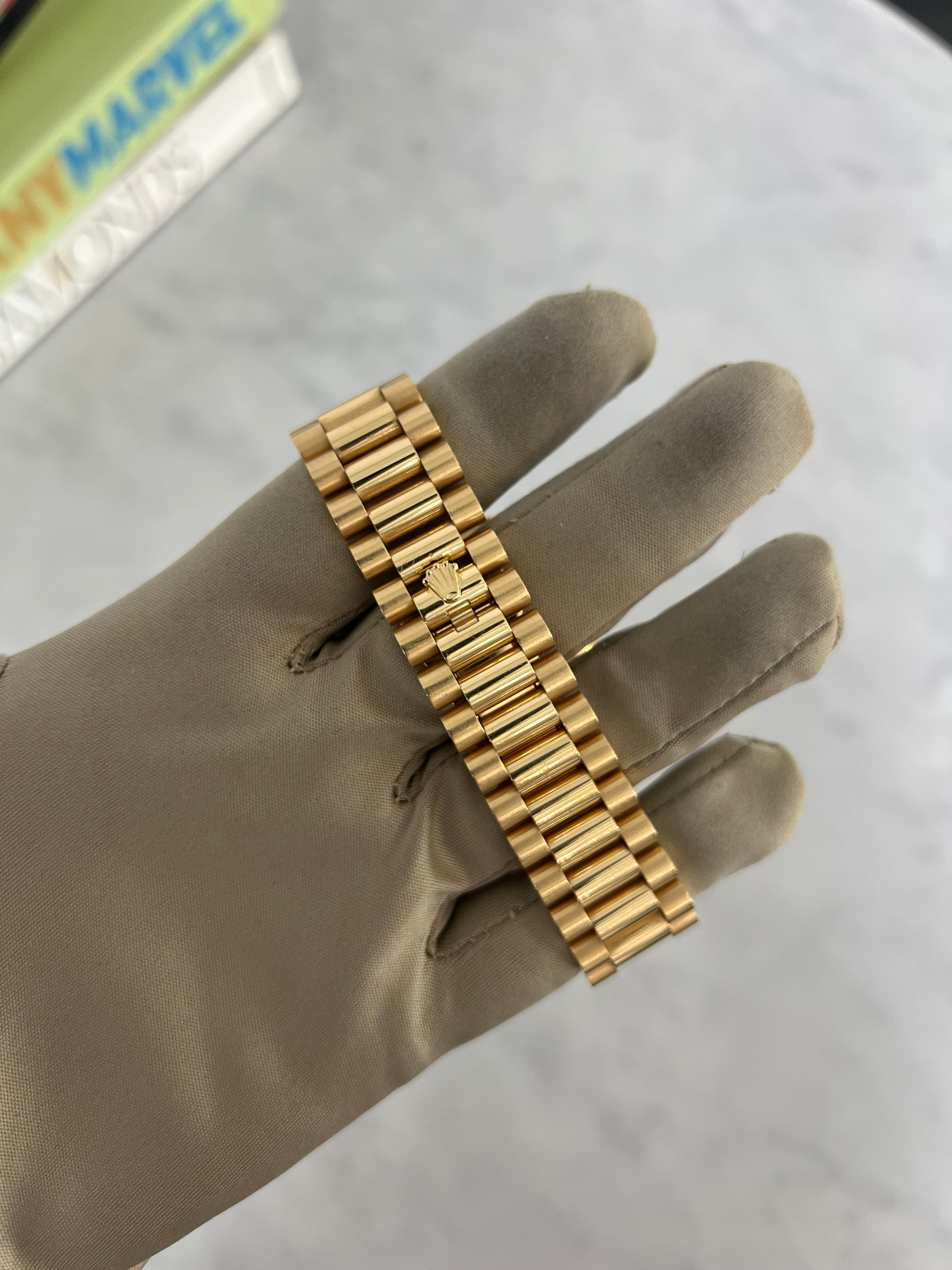 Rolex Day-Date Yellow Gold White Roman Dial Presidential Bracelet 40mm 228238/2023