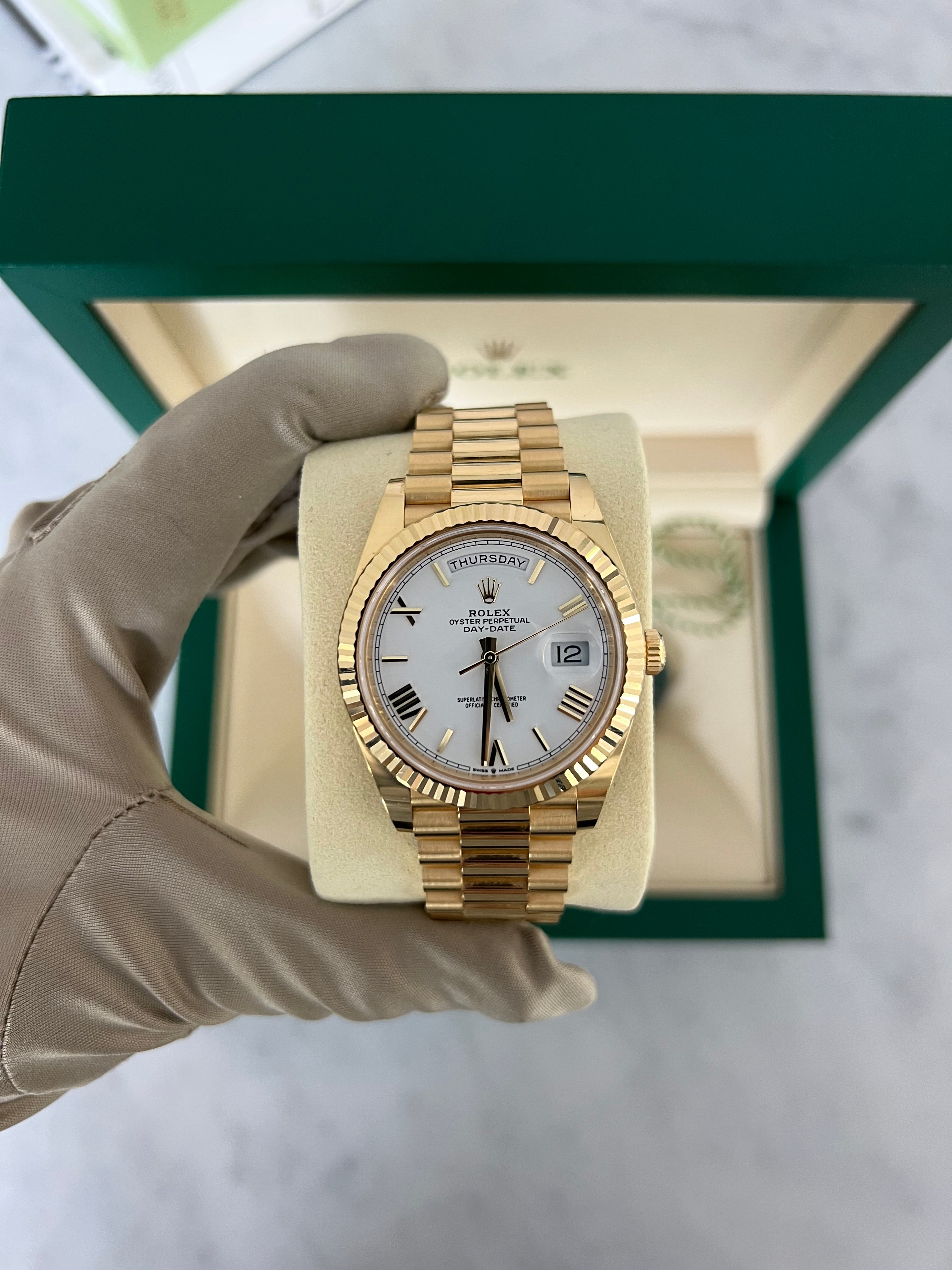 Rolex Day-Date Yellow Gold White Roman Dial Presidential Bracelet 40mm 228238/2023