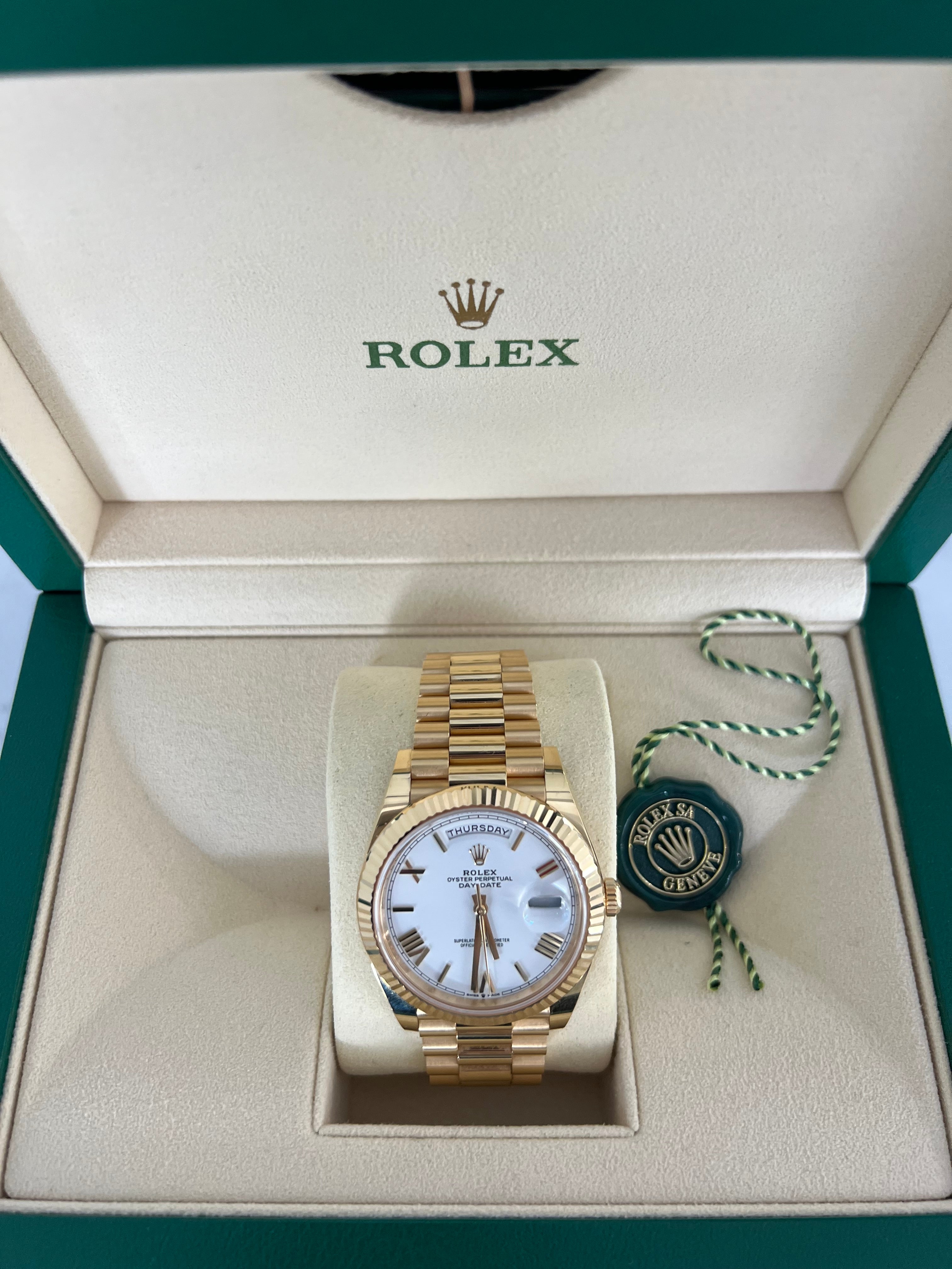 Rolex Day-Date Yellow Gold White Roman Dial Presidential Bracelet 40mm 228238/2023