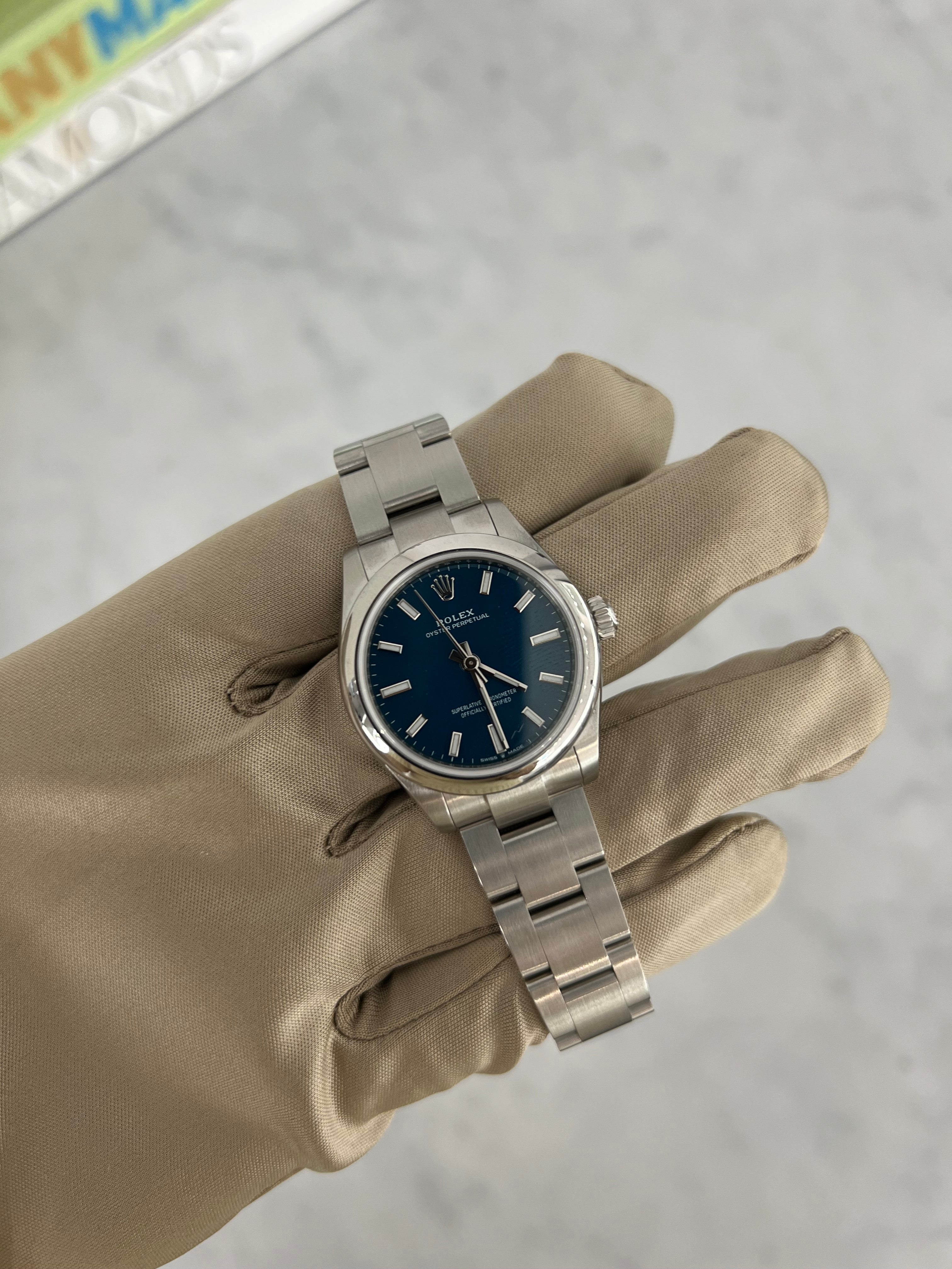 Rolex Oyster Perpetual Blue Dial Smooth Bezel 31mm 277200/2025