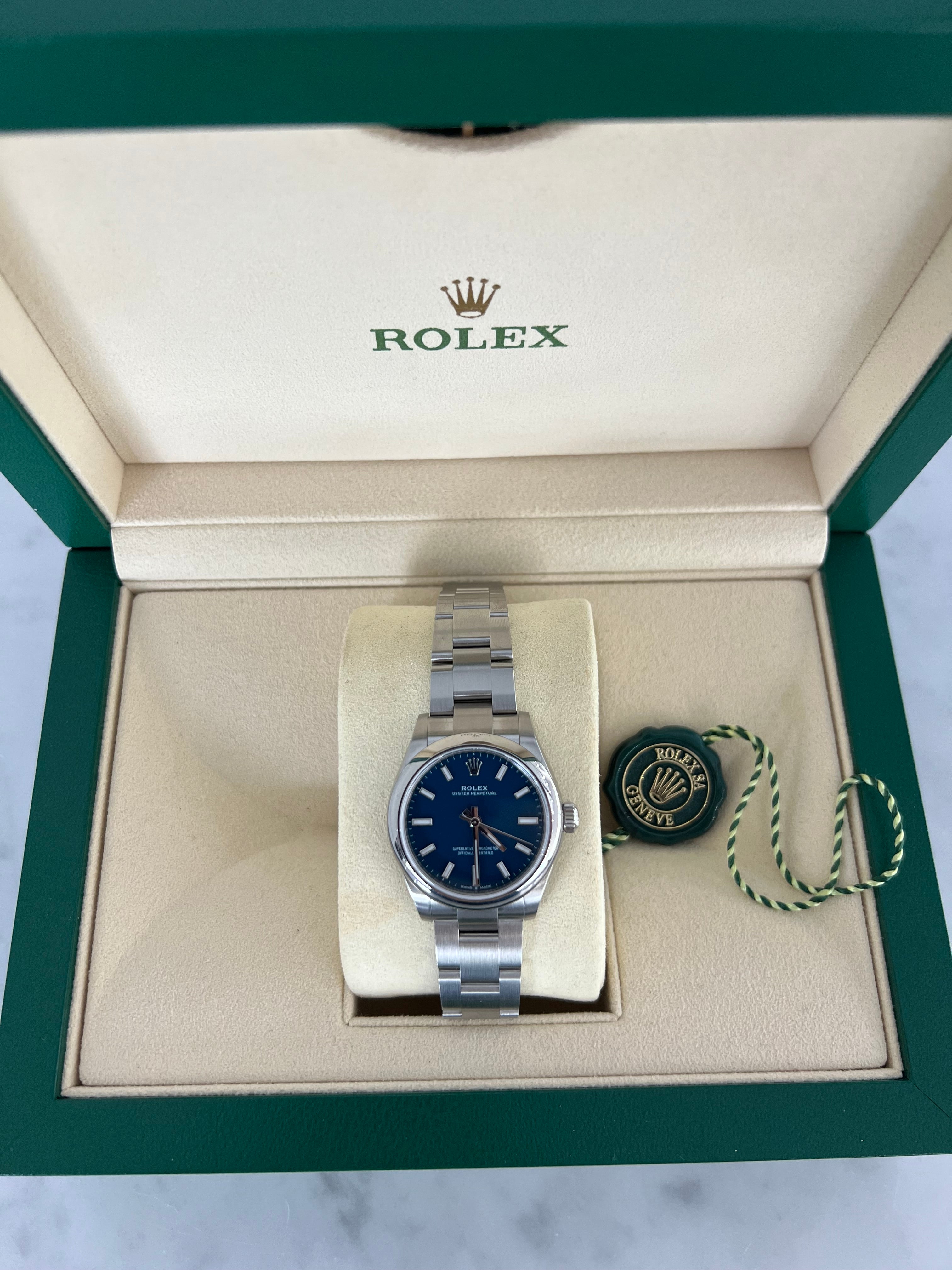 Rolex Oyster Perpetual Blue Dial Smooth Bezel 31mm 277200/2025