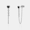 Boucles d'oreilles en chaîne en forme de cœur bordé de diamants