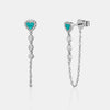 Boucles d'oreilles en chaîne en forme de cœur bordé de diamants
