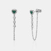 Boucles d'oreilles en chaîne en forme de cœur bordé de diamants