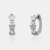 Boucles d'oreille huggies avec papillon et diamants