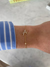 Bracelet d'initiales en cursive avec lunette en diamant