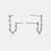 Boucle d'oreille en chaîne avec pendentifs en diamant