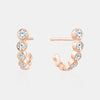 Boucles d'oreilles serties de diamants gradués