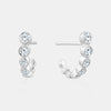Boucles d'oreilles serties de diamants gradués
