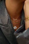 Collier à diamants et saphirs bleus en forme d'œil maléfique cannelé