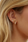 Boucles d'oreilles cœur serties de topaze blanche