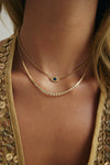 Collier de perles en diamant et saphir Oeil maléfique
