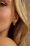 Boucles d'oreilles avec lunette en diamant et saphir