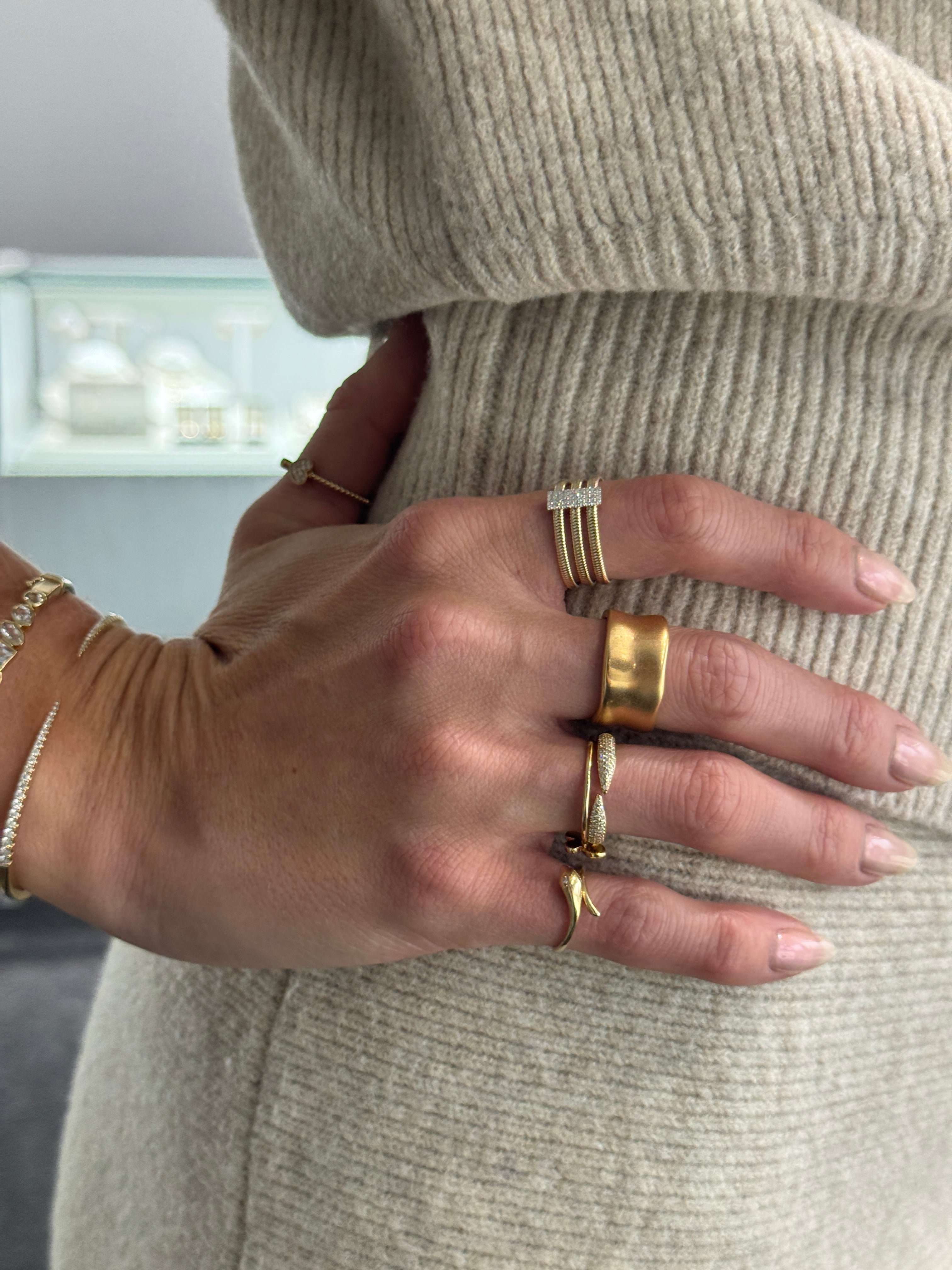 Three Row Omega Diamond Ring