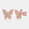 Boucles d'oreilles papillon en or demi-pavé