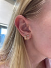 Boucles d'oreilles serties de diamants gradués