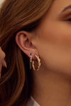 Boucles d'oreilles en chaîne en forme de cœur bordé de diamants