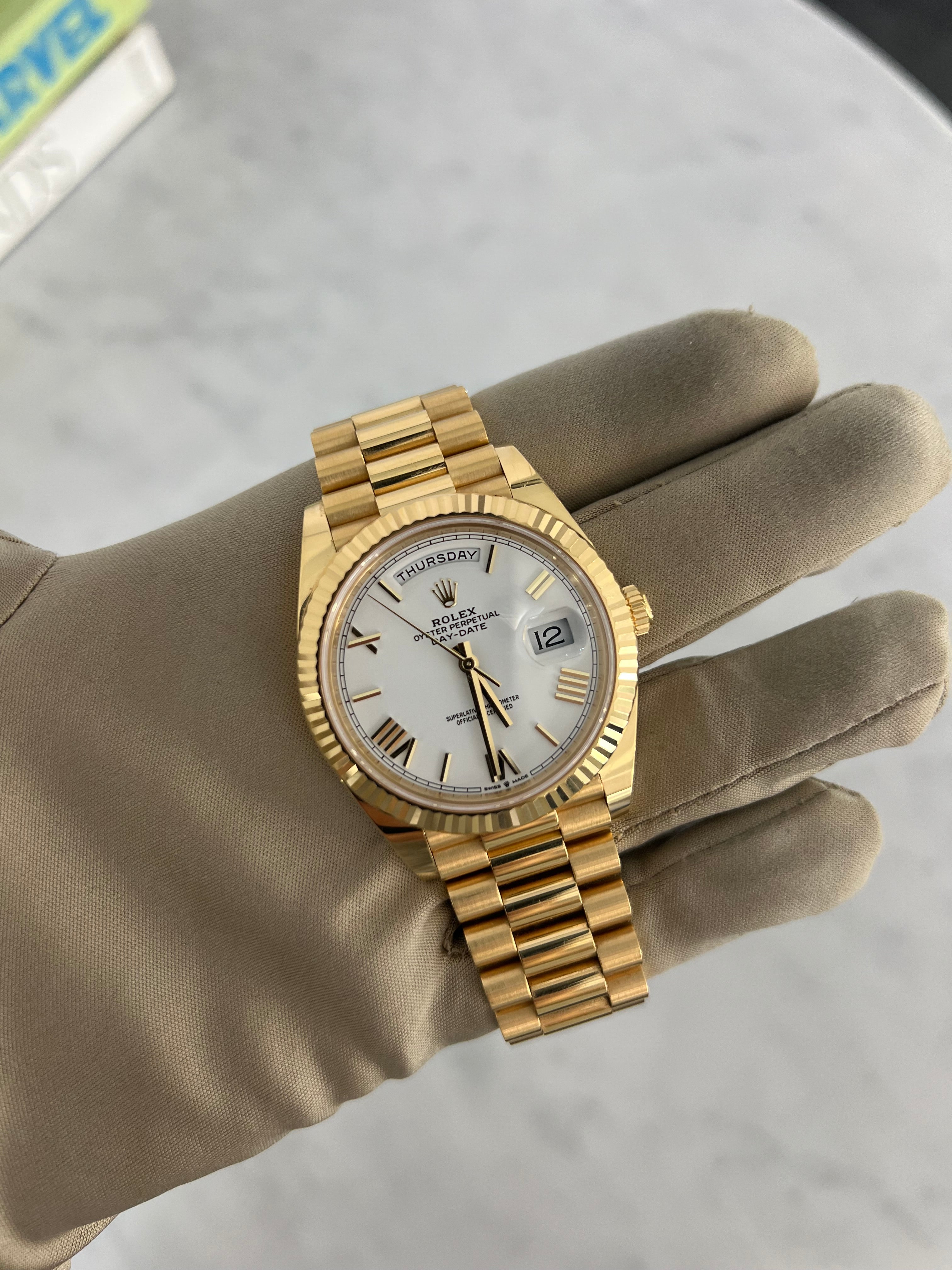 Rolex Day-Date Yellow Gold White Roman Dial Presidential Bracelet 40mm 228238/2023