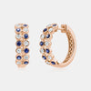 Boucles d'oreilles avec lunette en diamant et saphir