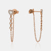 Boucles d'oreilles en chaîne en forme de cœur bordé de diamants