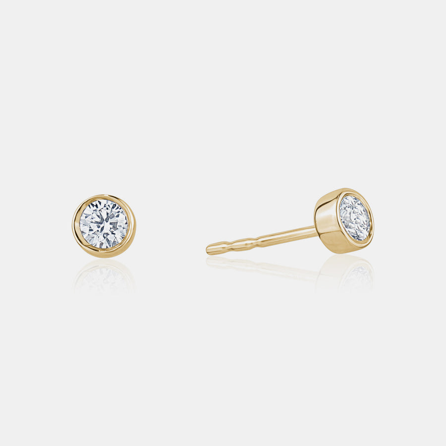 Boucles d'oreilles rondes serties de diamants