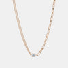 Collier mi-chaîne mi-trombones