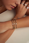 Bracelet avec diamant en forme de poire sertie d'un chaton