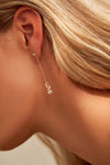 Boucles d'oreilles chaîne "Love" en diamant