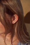 Boucles d'oreilles à double lobe de diamant avec étoile