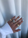 Bague spirale avec initiale et chaton en diamant